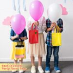 A set of 24 colorful non-woven tote bags with various back-to-school designs like pencils, crayons, and apples.