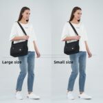 A large black nylon MINTEGRA satchel handbag with a top handle and an adjustable shoulder strap, showcasing its spacious and