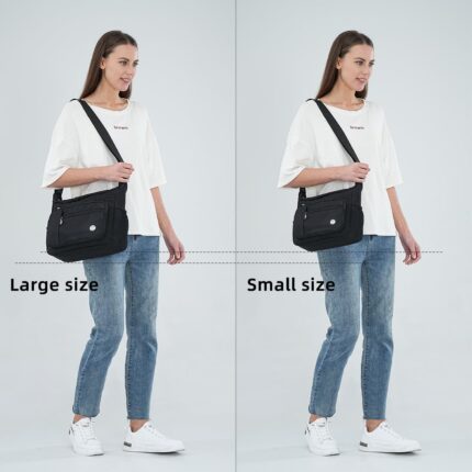 A large black nylon MINTEGRA satchel handbag with a top handle and an adjustable shoulder strap, showcasing its spacious and