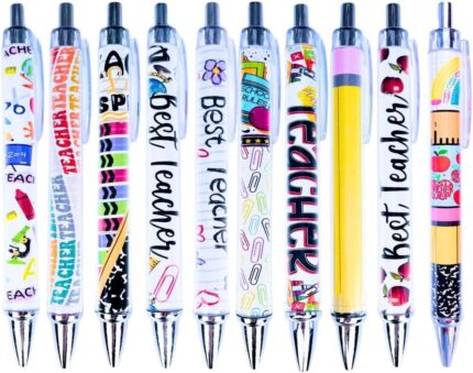 A close-up view of ten YJ PREMIUMS multicolor retractable ballpoint pens with various teaching-themed designs.